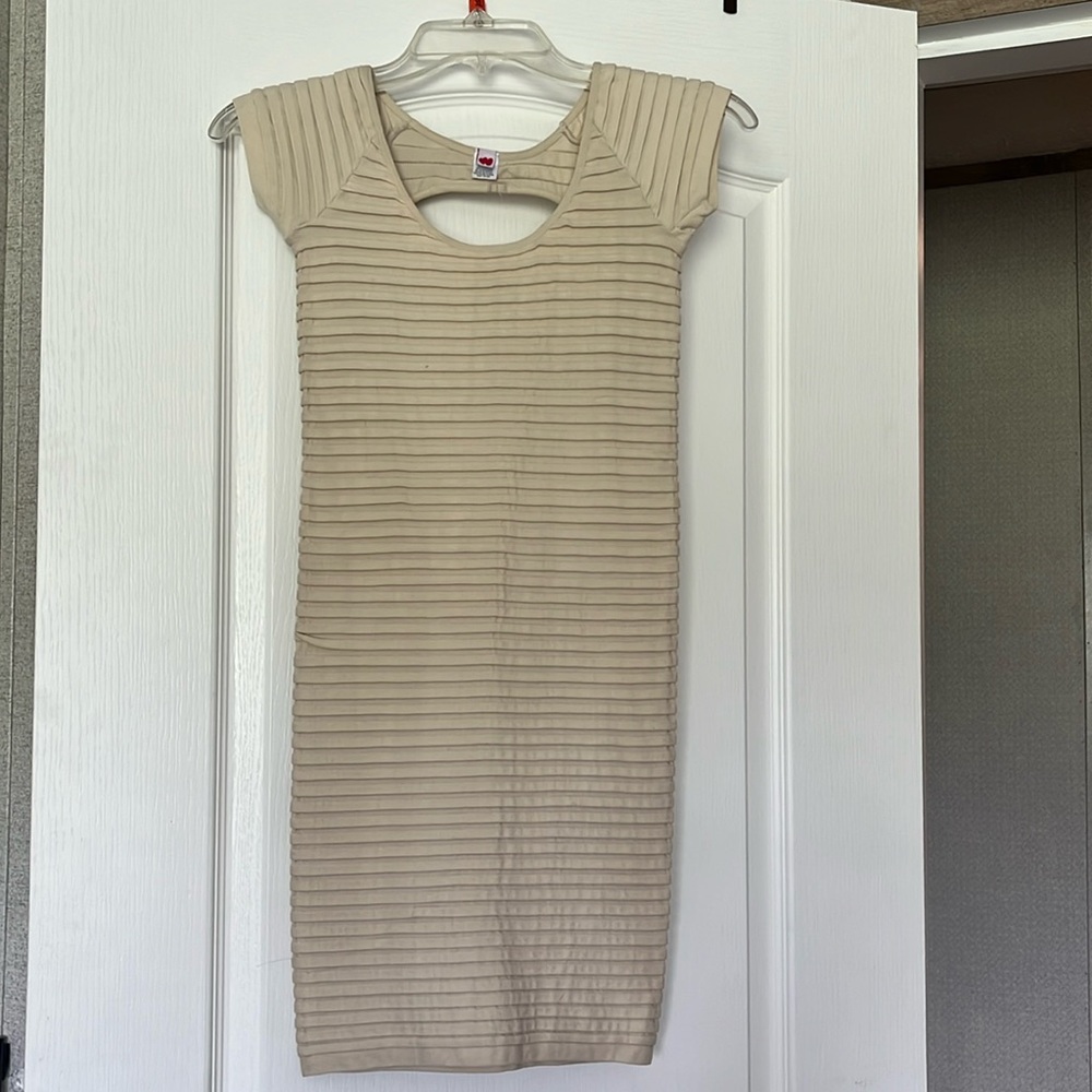 Cream colored backless mid thigh body con dress